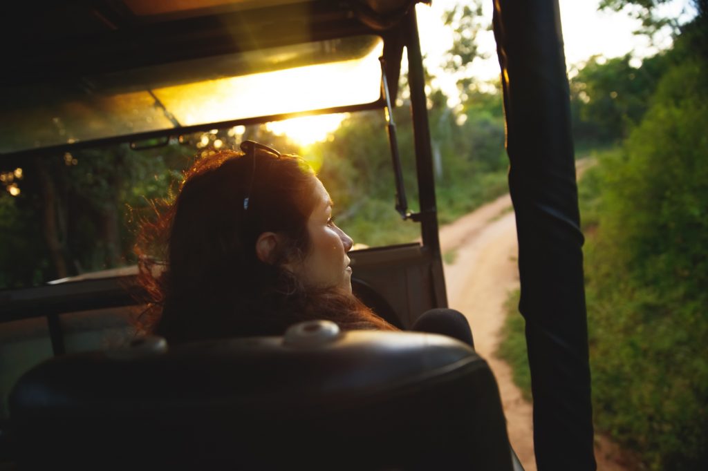 Woman on Safari game drive